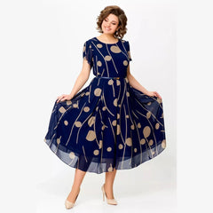Navy polka dot chiffon midi dress with short sleeves and gathered skirt