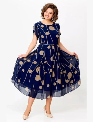 Navy polka dot chiffon midi dress with short sleeves and gathered skirt