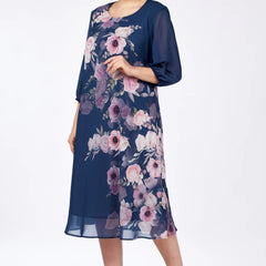 Navy floral midi dress with sheer 3/4 sleeves and round neckline, side view