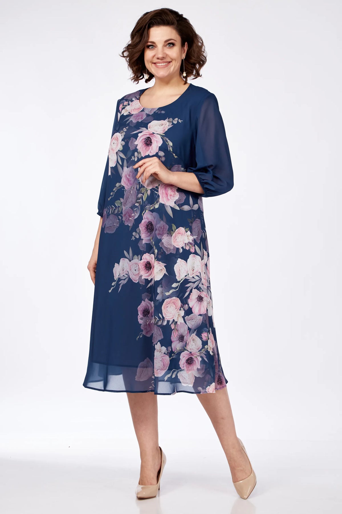 Navy floral midi dress with sheer 3/4 sleeves and round neckline, side view