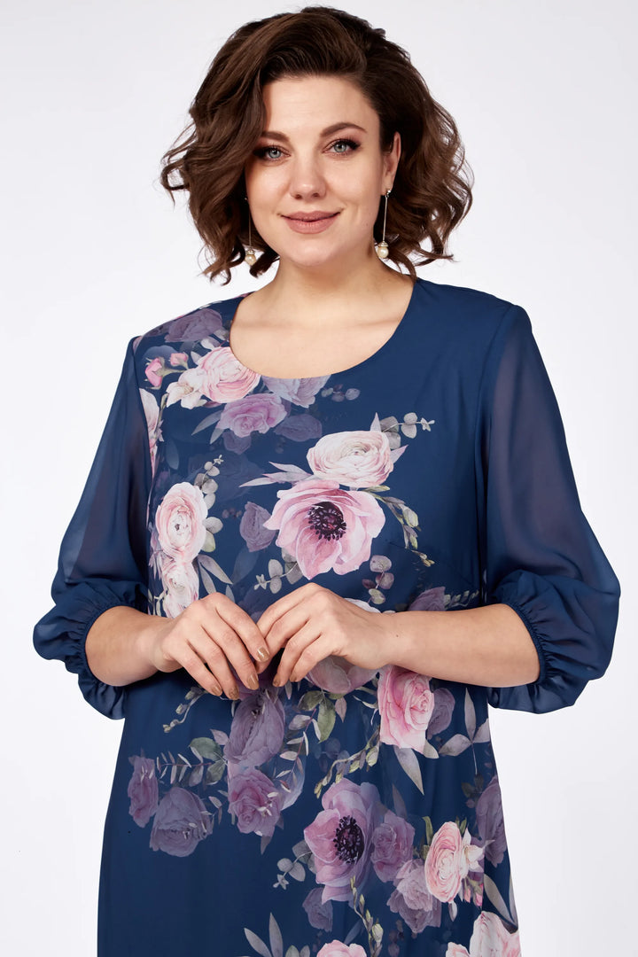 Navy floral midi dress close-up with round neckline and sheer 3/4 sleeves