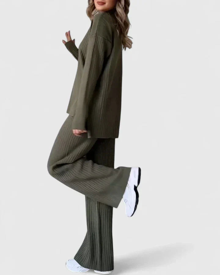 Ribbed knit two-piece set in olive green, side view of turtleneck top and flared pants
