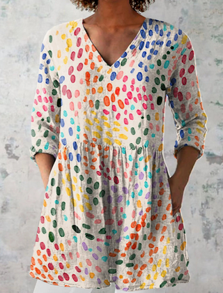 Multicolor long-sleeve V-neck blouse with allover dot pattern and gathered waist