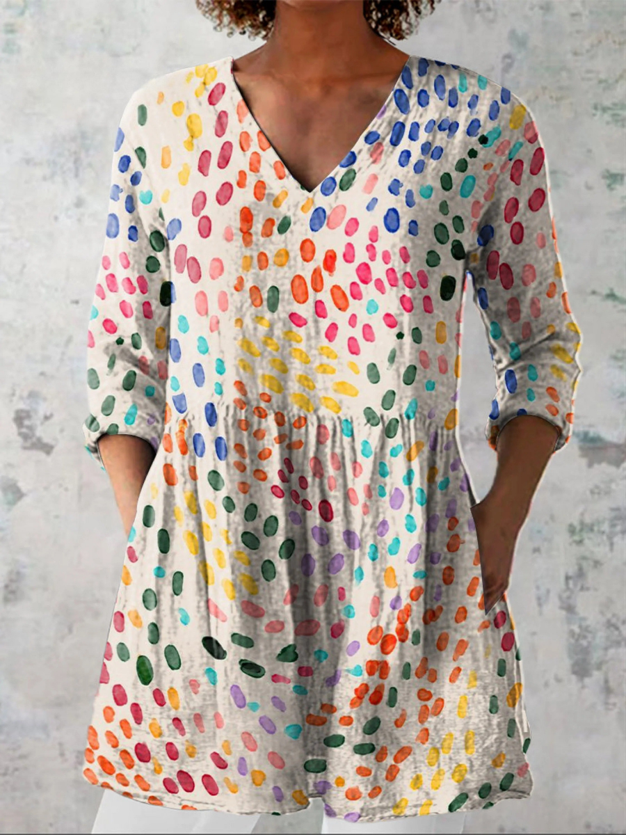 Multicolor long-sleeve V-neck blouse with allover dot pattern and gathered waist