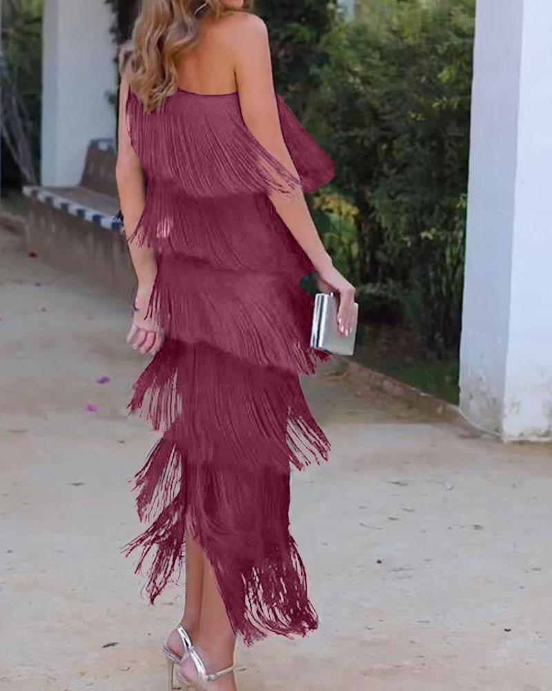 Off-shoulder tiered fringe maxi dress in rose red, side view with draped tassels