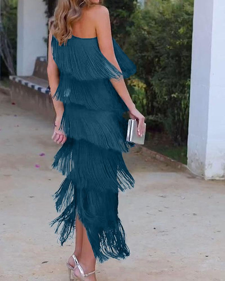 Off-shoulder tiered fringe maxi dress in lake blue, side view with layered fringe