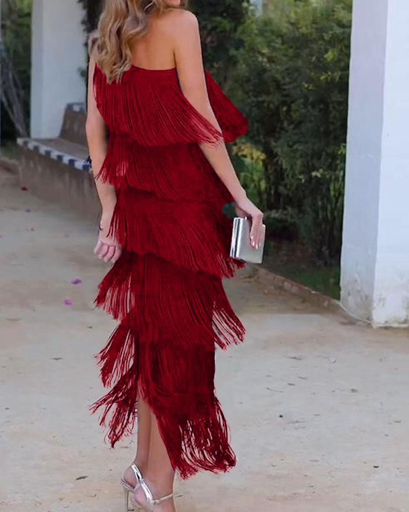 Red one-shoulder fringe dress with layered tassel tiers and fitted silhouette