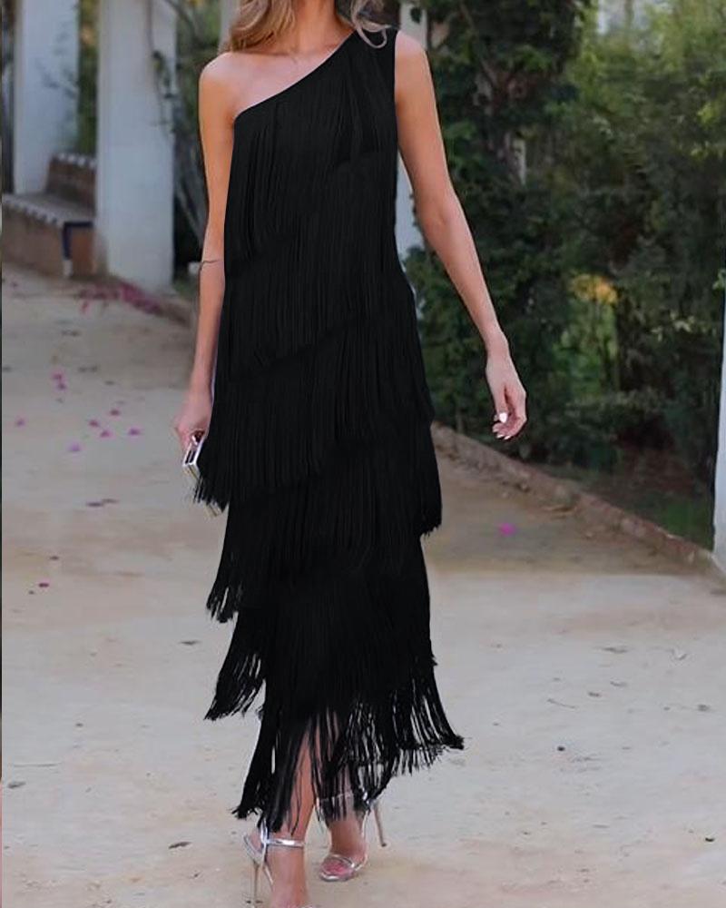 Black one-shoulder fringe dress with layered tassel tiers and fitted silhouette