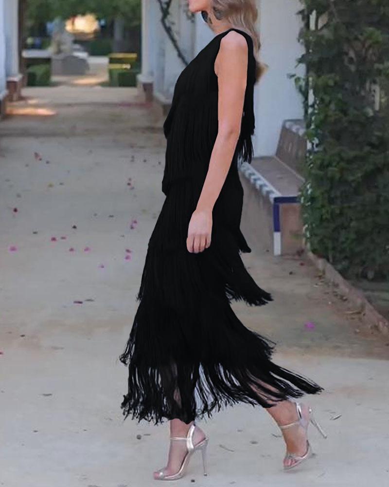 Black one-shoulder fringe dress with layered tassel tiers and fitted silhouette