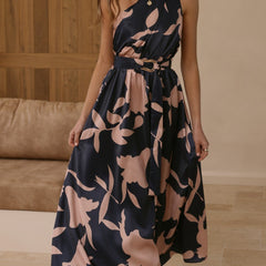 Navy maxi dress with pink floral print, belted waist, sleeveless V-neck.