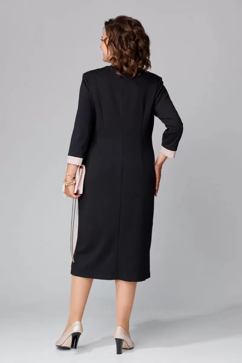 Black V-neck dress back view with white contrast trim along seams, 3/4 sleeves