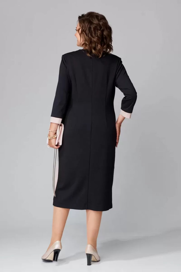 Black V-neck dress back view with white contrast trim along seams, 3/4 sleeves