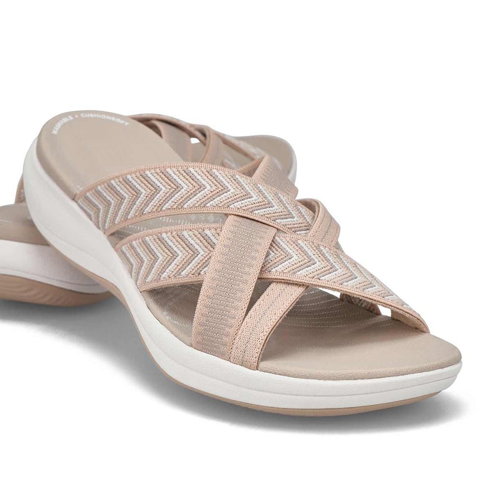 Beige orthopedic comfort sandals with zigzag strap and wide toe thong.