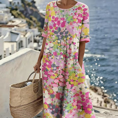 Pink floral summer midi dress with short sleeves, round neckline, gathered waist