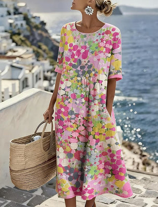 Pink floral summer midi dress with short sleeves, round neckline, gathered waist