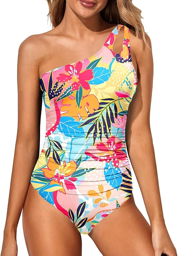 One-shoulder one-piece swimsuit in colorful tropical floral print with ruching at bust