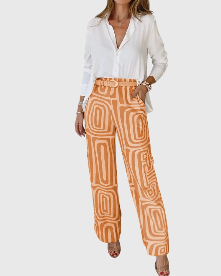 Emilia™ pants set: white blouse, orange geometric trousers, studded belt