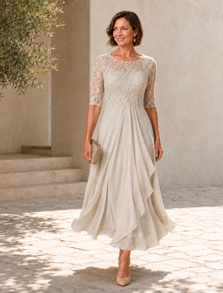 Ivory lace midi dress with 3/4 sleeves, gathered waist and draped layered hem