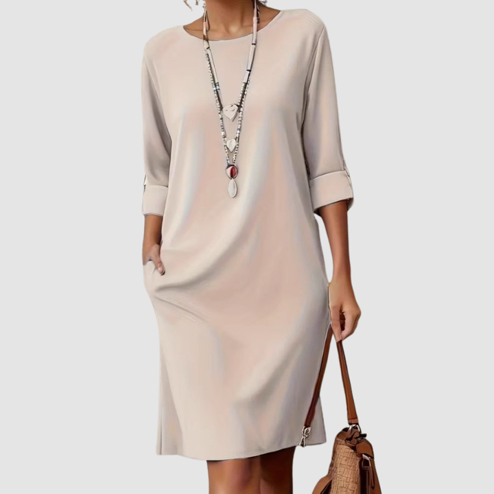 Cream crew-neck midi dress with 3/4 sleeves and side slit, relaxed fit.