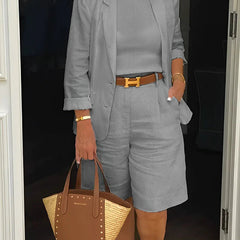 Gray two-piece suit set with cropped blazer and matching shorts