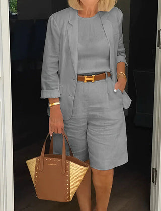 Gray two-piece suit set with cropped blazer and matching shorts