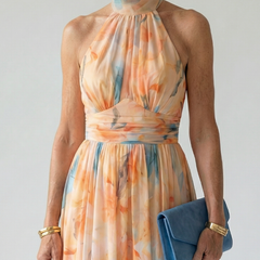 Halter midi dress, pastel orange-blue abstract print and ruched neckline