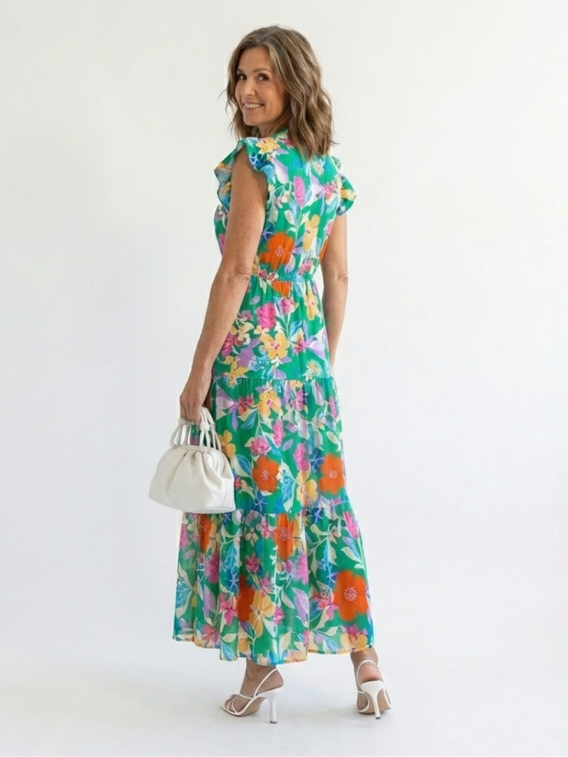 Floral V-neck tiered midi dress, teal base with bright multicolor floral print and tiered skirt
