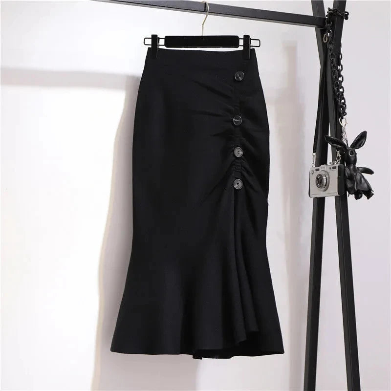Classic black asymmetric mermaid skirt with front button detail and side slit