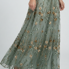 Sage green floral maxi dress skirt with gathered tiered panels and flowy hem