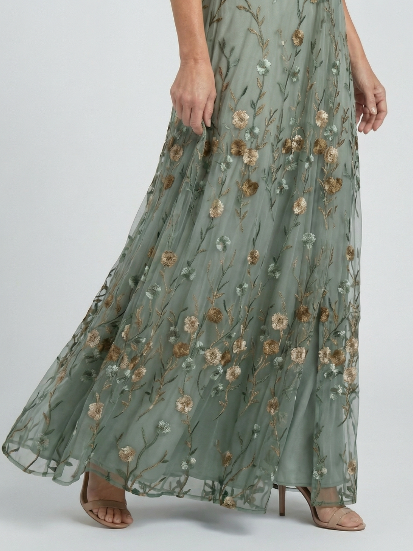 Sage green floral maxi dress skirt with gathered tiered panels and flowy hem