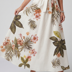 White botanical-panel maxi dress with draped skirt and elasticized waist