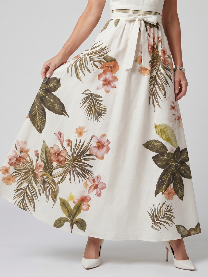 White botanical-panel maxi dress with draped skirt and elasticized waist