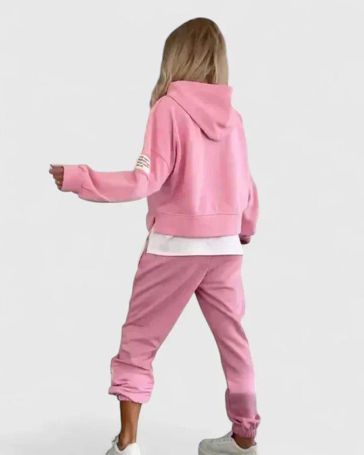 Pink back-view hooded sweatshirt and jogger set with white layered hem