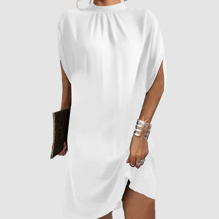 White short sleeve dress with high gathered neckline and side slit at hem
