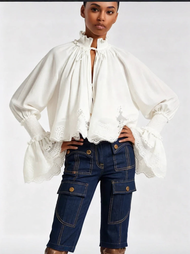 Vivienne blouse in white with ruffled high neck and puff sleeves, lace-trim hem