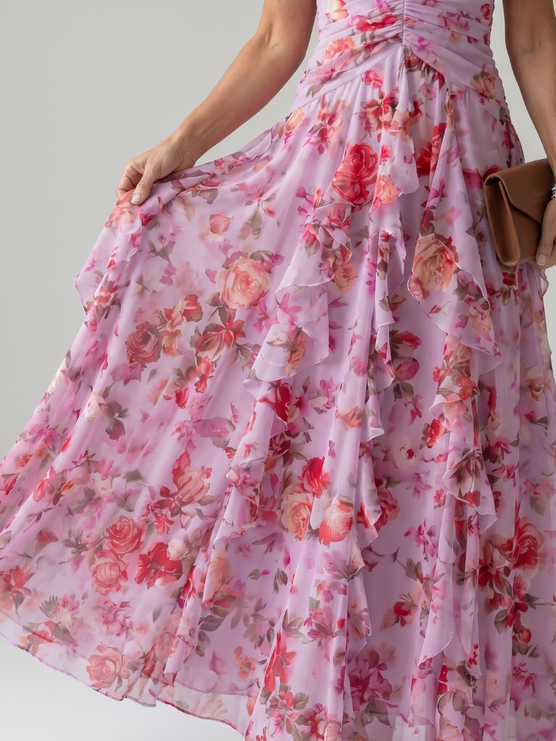 Pink floral maxi dress detail of ruched bodice and tiered, layered ruffle skirt