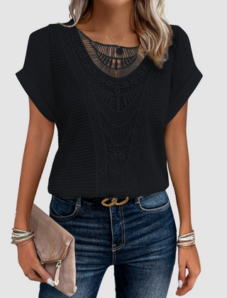 Sophie™ chic lace top in black knit with scalloped lace yoke and short sleeves.