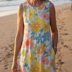 Sleeveless multicolor floral midi dress with round neckline and gathered waist