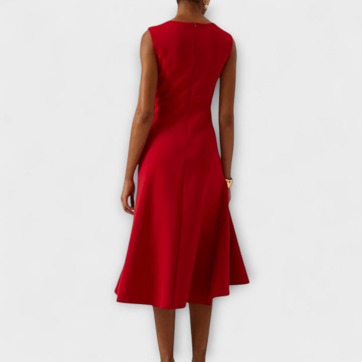 Sleeveless asymmetric midi dress in red with draped back panel and flared hem