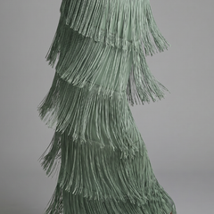 Green tiered midi fringe skirt of tassels on a long-sleeve V-neck dress