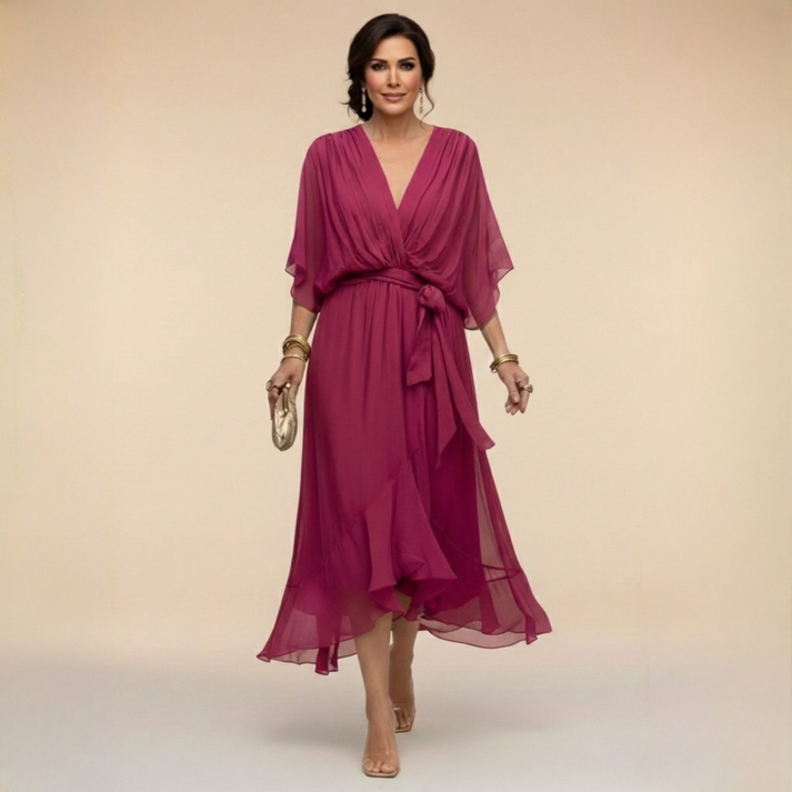 Burgundy V-neck wrap dress with tied waist and sheer chiffon mid-calf hem