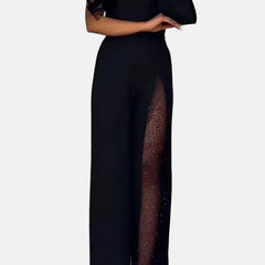 Black wide-leg jumpsuit with V-neck, short sleeves, sheer side leg panel