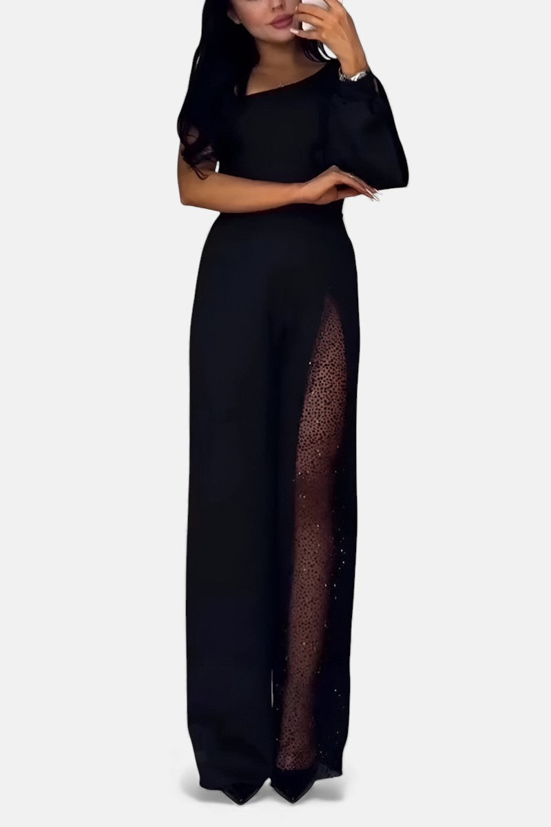 Black wide-leg jumpsuit with V-neck, short sleeves, sheer side leg panel