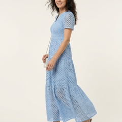 Sky blue V-neck tiered midi dress with short sleeves, side view, eyelet dot texture