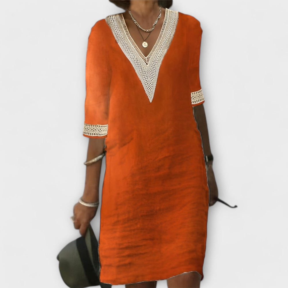 Elegant dress in orange with V-neck mesh trim and 3/4 sleeves