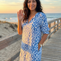 Blue patterned midi dress, V-neck short sleeves, full front standing pose