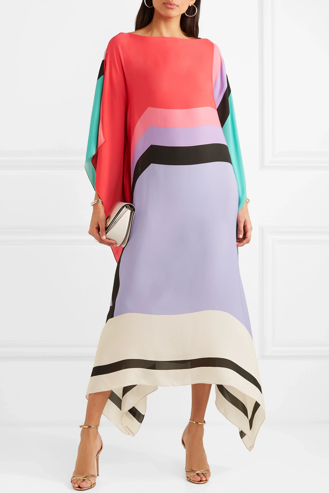 Red geometric kaftan with purple, teal, and cream color-block stripes, draped hem