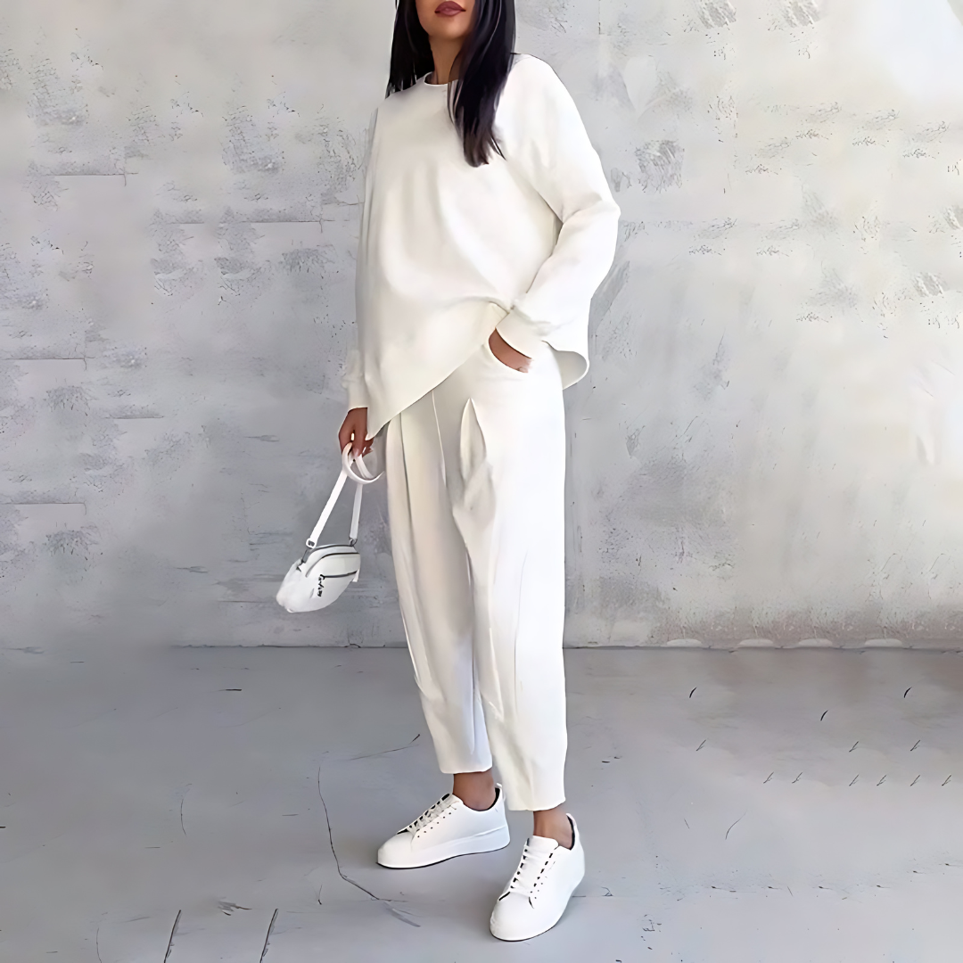 White two-piece lounge set with oversized long-sleeve top and tapered jogger pants