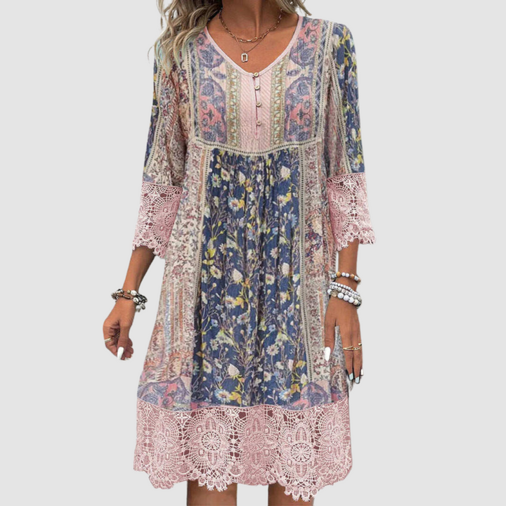 Boho dress with navy floral print, lace-trim sleeves, button front, tiered skirt