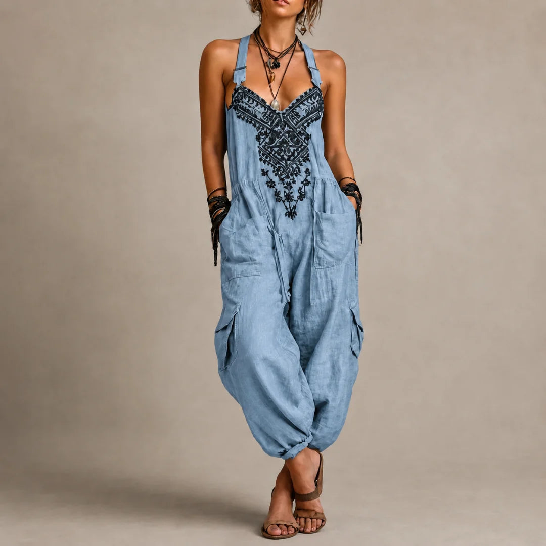 Blue boho overalls jumpsuit with embroidered V-neck straps and drawstring waist